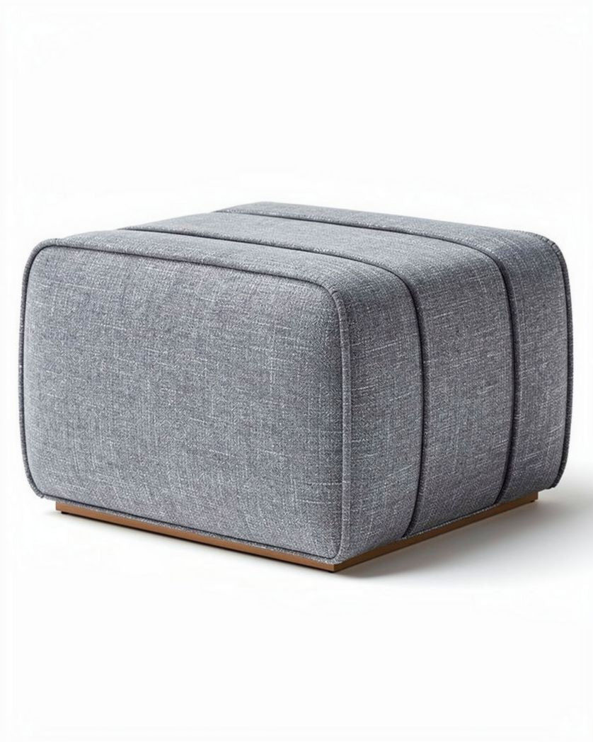 Hedendaagse hocker van grijs textiel met een afmeting van 45 x 45 x 40cm